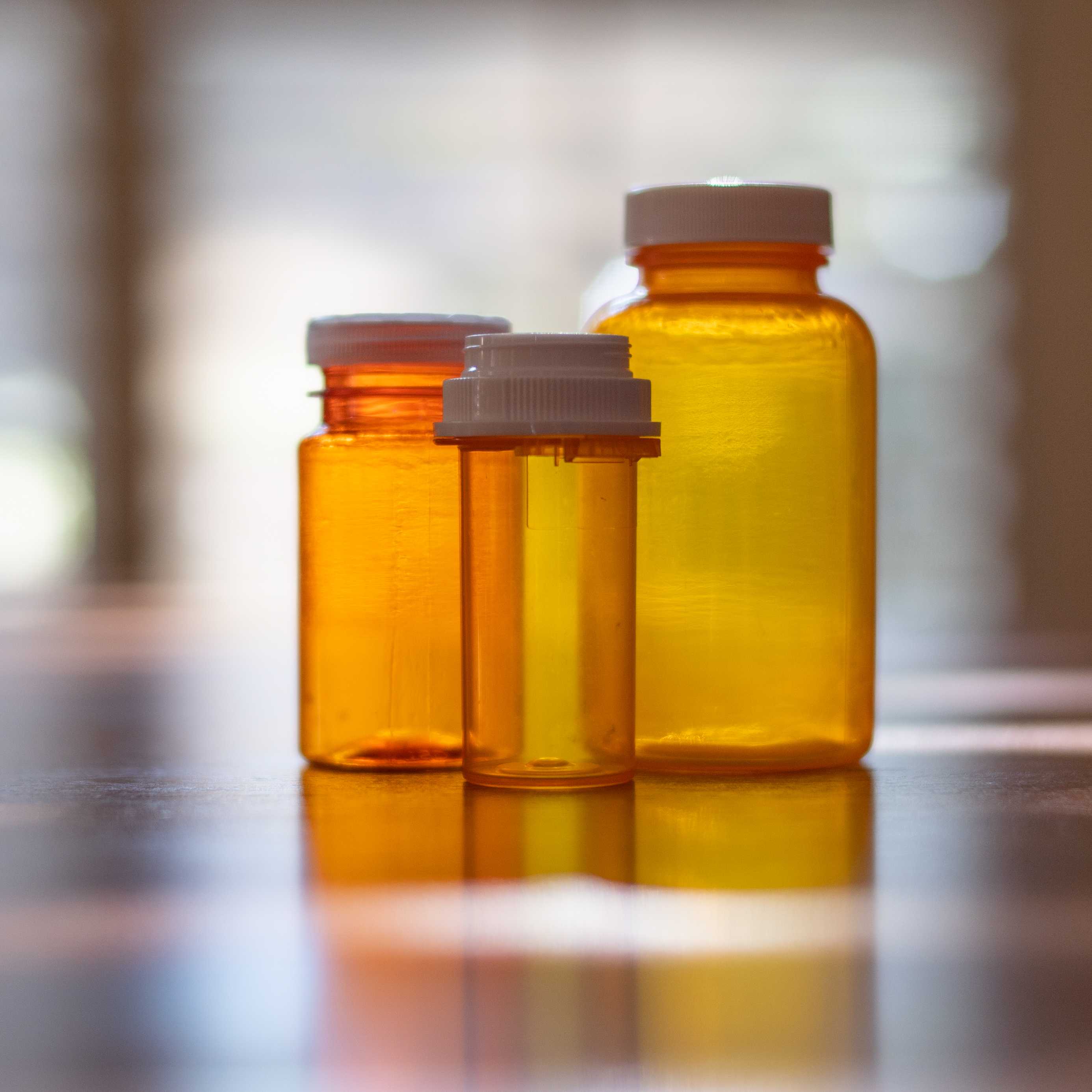 An image of medicine bottles on a table